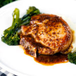 Thick cut honey mustard pork chops with roasted tenderstem broccoli and mashed potato.