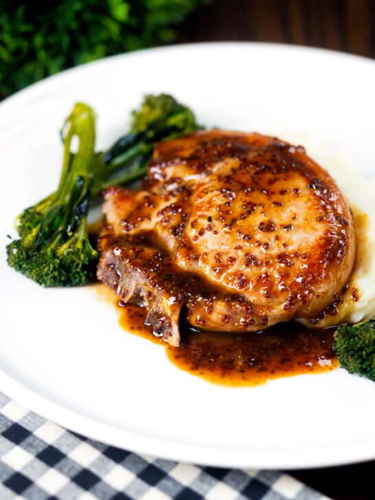 Thick cut honey mustard pork chops with roasted tenderstem broccoli and mashed potato.