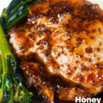 Close-up thick cut honey mustard pork chops with roasted tenderstem broccoli and mashed potato featuring a title overlay.