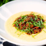 Sausage ragu made with Italian sausages and tomatoes served with polenta.