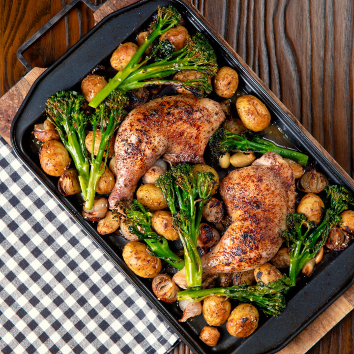 Preserved lemon chicken tray bake with potatoes, garlic, shallots and broccoli.