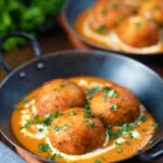 Malai kofta, vegetarian paneer and potato "meatball" curry.