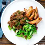 Overhead peri peri chicken livers served with beetroot salad and wedges featuring a title overlay.
