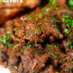 Close-up peri peri chicken livers served with beetroot salad and wedges featuring a title overlay.