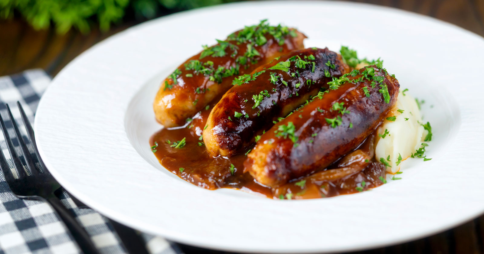 Slow Cooker Sausages with Onions and BBQ Sauce Krumpli