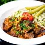 Hungarian birkap&ouml;rk&ouml;lt or mutton stew served with nokedli.
