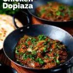 Anglo Indian chicken dopiaza curry served with chapatis.