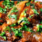 Close-up Anglo Indian chicken dopiaza curry.