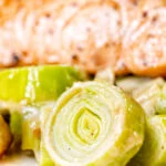 Close up creamed leeks with thyme and pepper.