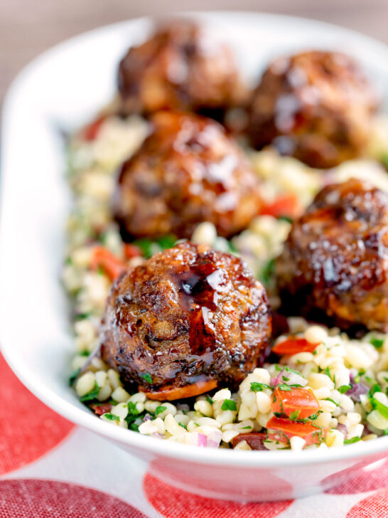 Harissa beef meatballs served with bulgur wheat.