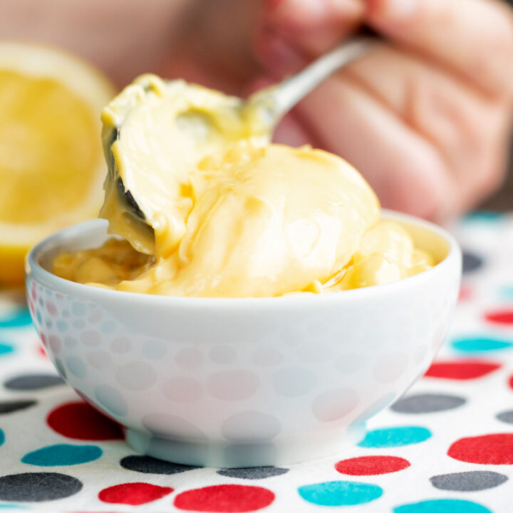 Creamy golden homemade mayonnaise made without a blender.