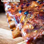 Close up apple and honey glazed Instant Pot pork ribs featuring a title overlay.