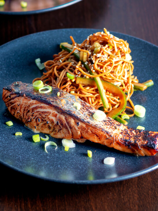 Korean yang nyum inspired grilled salmon fillet served with noodles.