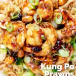 Overhead close-up kung pao king prawns or shrimp with peanuts and egg fried rice featuring a title overlay.