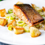 Pan fried salmon fillet with crispy skin served with creamed leeks and parmentier potatoes.