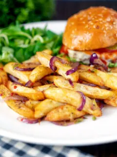 Chinese takeaway style salt and pepper chips served with a cheese burger.