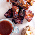 Overhead slow cooker char siu pork ribs featuring a title overlay.