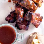 Overhead slow cooker char siu pork ribs featuring a title overlay.