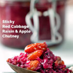 Close-up red cabbage chutney with large golden raisins on a spoon featuring a title overlay.