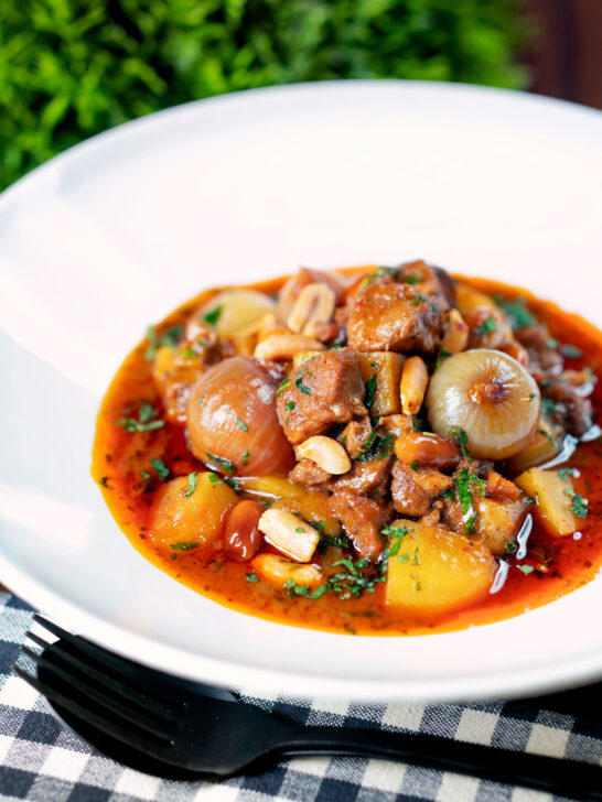 Slow-cooked Thai lamb massaman curry with potatoes, shallots and peanuts.