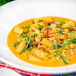 Thai chicken noodle soup with sugar snap peas and baby corn.