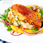 Air fryer stuffed chicken breast with buffalo mozzarella cheese and jalapeno chilli peppers featuring a title overlay.