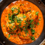 Overhead close-up Indian chicken kofta or meatball curry.