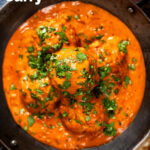 Overhead close-up Indian chicken kofta or meatball curry featuring a title overlay.