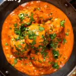 Overhead close-up Indian chicken kofta or meatball curry featuring a title overlay.