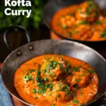 Indian chicken kofta or meatball curry served in an iron karai featuring a title overlay.