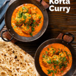 Overhead Indian chicken kofta or meatball curry served with naan bread featuring a title overlay.