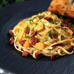 Spanish chorizo sausage and shredded leek pasta.