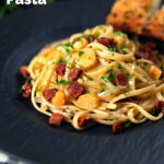 Spanish chorizo sausage and shredded leek pasta featuring a title overlay.