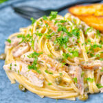 Garlicky and creamy lemon chicken pasta with capers and parsley.