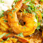 Close-up quick and easy Indian inspired prawn curry.
