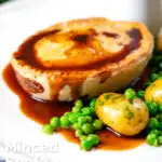 Homemade minced beef and onion pie served with peas and potatoes featuring a title overlay.