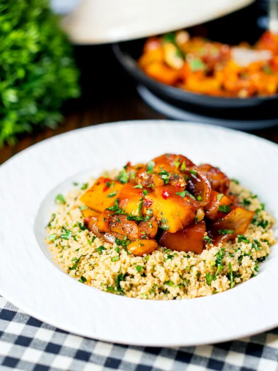 Moroccan influenced butternut squash tagine served with herby couscous.