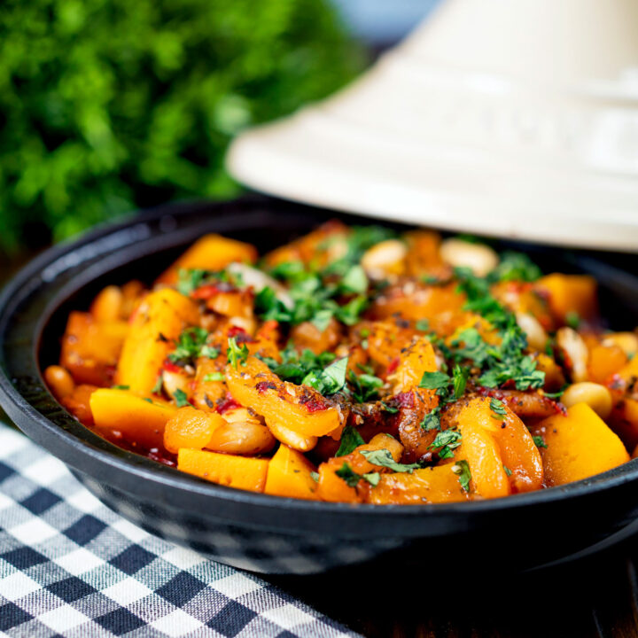 Moroccan influenced butternut squash tagine with dried apricots, almonds and rose harissa.