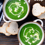 Overhead spinach and fennel soup with fresh fennel fronds and bread featuring a title overlay.