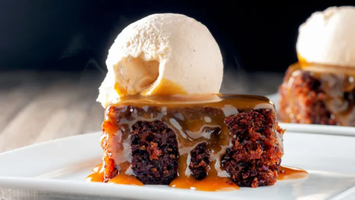 Cartmel style sticky toffee pudding served with caramel sauce and vanilla ice cream.