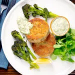 Overhead tinned mackerel fish cakes with homemade tartar sauce.