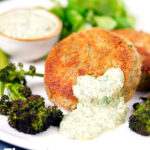 Tinned mackerel fish cakes with homemade tartar sauce featuring a title overlay.