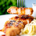 Close-up showing the texture of fried Japanese tonkatsu pork schnitzel.