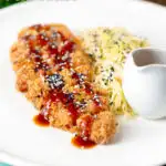 Japanese Tonkatsu pork cutlet served with katsu sauce and "soused" cabbage featuring a title overlay.