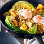 Leftover cabbage and potato bake with eggs and mustard.