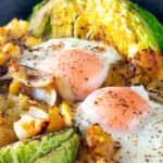 Close-up vegetarian cabbage and potato bake with eggs.