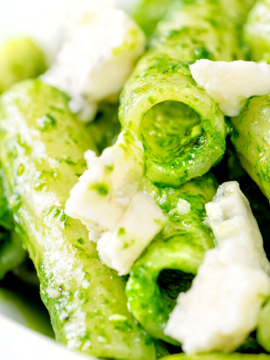 Close up wild garlic pesto served with rigatoni and gorgonzola cheese.