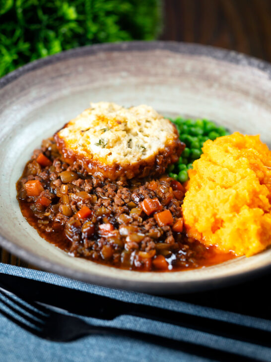Mince and dumplings stew served with swede and carrot mash.