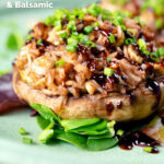 Close-up brown rice stuffed mushrooms with cheddar cheese and balsamic featuring a title overlay.