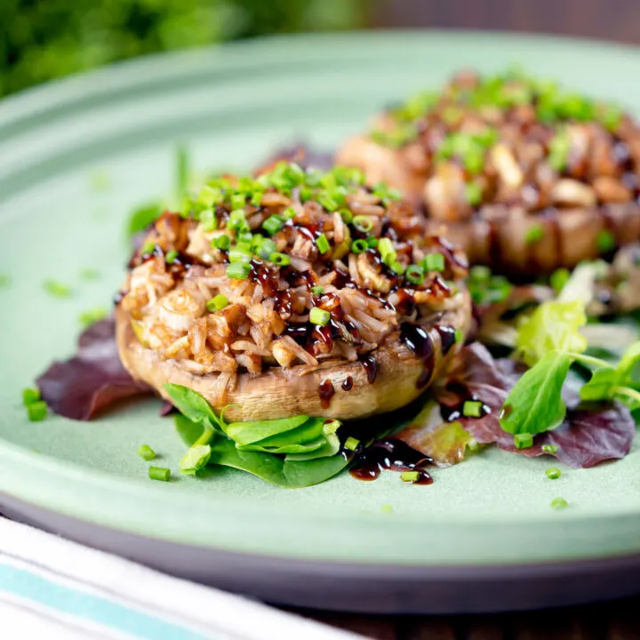 Vegetarian brown rice and cheddar cheese stuffed Portobello mushrooms with balsamic vinegar.